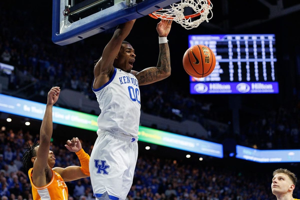 Feb 11, 2025; Lexington, Kentucky, USA; Kentucky Wildcats guard Otega Oweh (00) dunks the ball during the second half against the Tennessee Volunteers at Rupp Arena at Central Bank Center. Mandatory Credit: Jordan Prather-Imagn Images