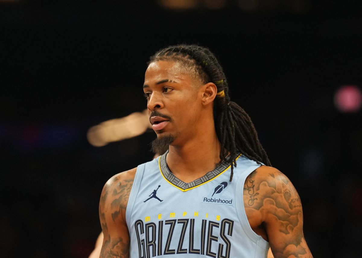 Feb 11, 2025; Phoenix, Arizona, USA; Memphis Grizzlies guard Ja Morant (12) looks on against the Phoenix Suns during the first half at Footprint Center. Mandatory Credit: Joe Camporeale-Imagn Images