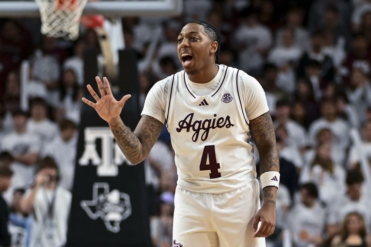 Feb 11, 2025; College Station, Texas, USA; Texas A&M Aggies guard Wade Taylor IV (4) reacts during the first half against the Georgia Bulldogs at Reed Arena. Mandatory Credit: Maria Lysaker-Imagn Images