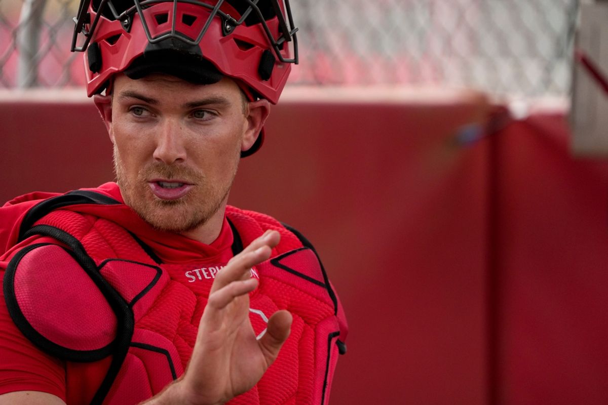Cincinnati Reds catcher Tyler Stephenson (37) catches a throwing session at the Cincinnati Reds Player Development Complex in Goodyear, Ariz., on Wednesday, Feb. 12, 2025.