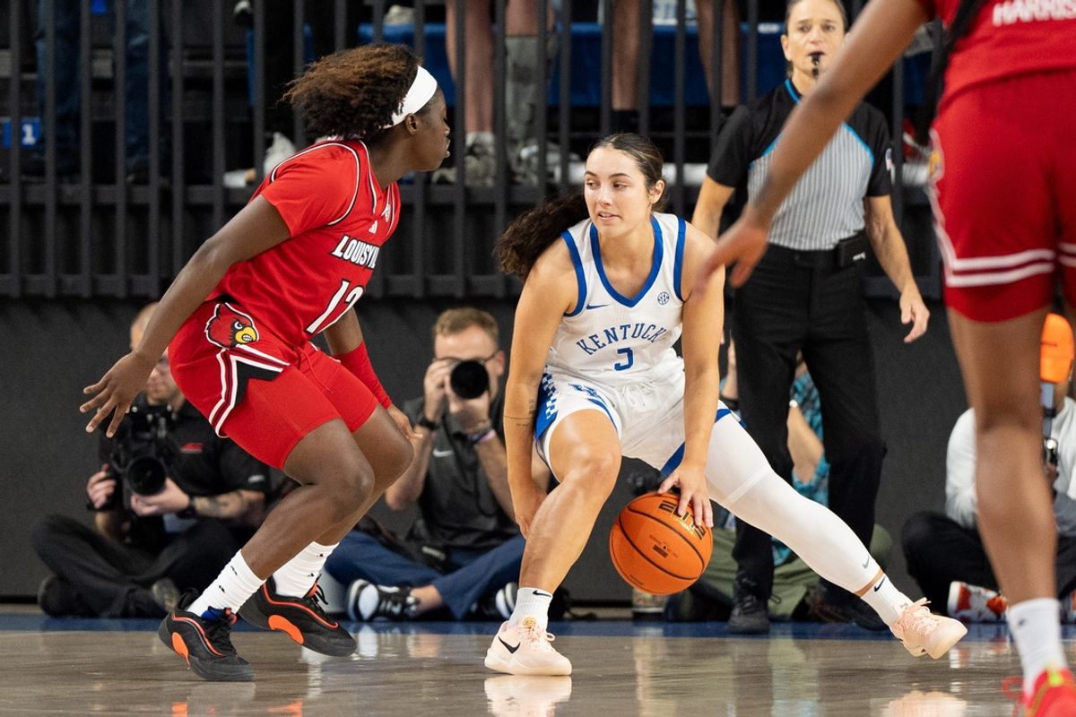 Kentucky guard Georgia Amoore (3) dribbles against Louisville guard Ja'Leah Williams (12) during a game onNov. 16, 2024 at Memorial Coliseum in Lexington, Ky.