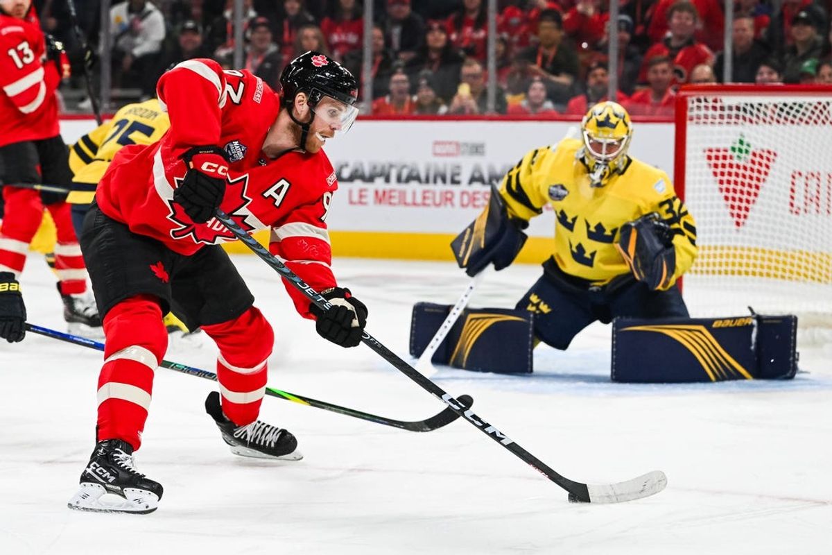 Feb 12, 2025; Montreal, Quebec, CAN; [Imagn Images direct customers only] Team Canada forward Connor McDavid (97) shoots against Team Sweden goalie Filip Gustavsson (32) in the first period during a 4 Nations Face-Off ice hockey game at Bell Centre. Mandatory Credit: David Kirouac-Imagn Images