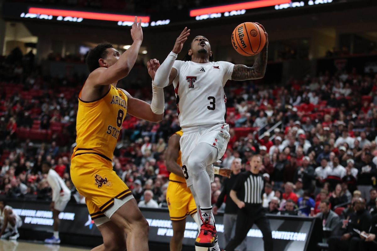 Feb 12, 2025; Lubbock, Texas, USA;  Texas Tech Red Raiders guard Elijah Hawkins (3) goes to the rim against Arizona State Sun Devils forward Basheer Jihad (8) in the first half at United Supermarkets Arena. Mandatory Credit: Michael C. Johnson-Imagn Images
