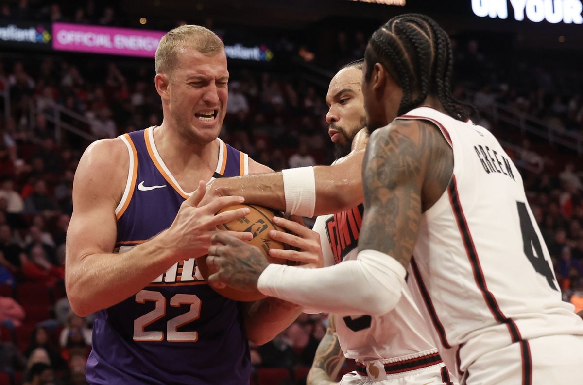 Feb 12, 2025; Houston, Texas, USA; Phoenix Suns center Mason Plumlee (22) and Houston Rockets forward Dillon Brooks (9) and  guard Jalen Green (4) fight over a rebound in the second quarter at Toyota Center. Mandatory Credit: Thomas Shea-Imagn Images