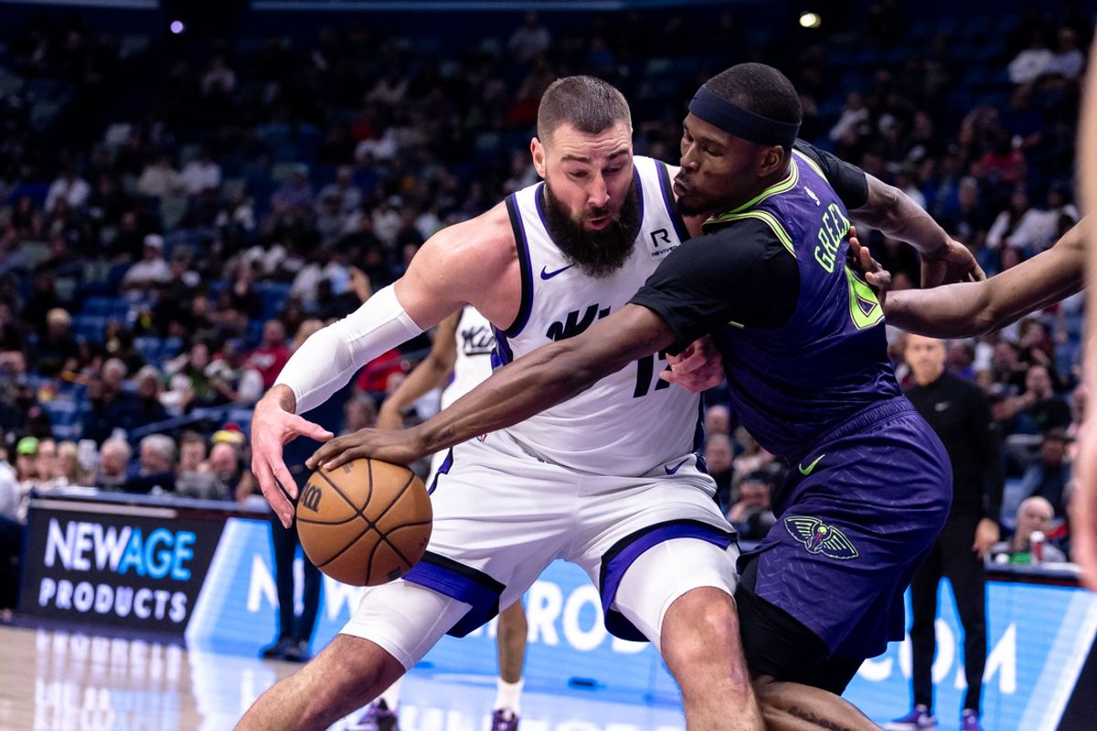 Feb 12, 2025; New Orleans, Louisiana, USA;  New Orleans Pelicans guard Javonte Green (4) steals the ball from Sacramento Kings center Jonas Valanciunas (17) during the first half at Smoothie King Center. Mandatory Credit: Stephen Lew-Imagn Images