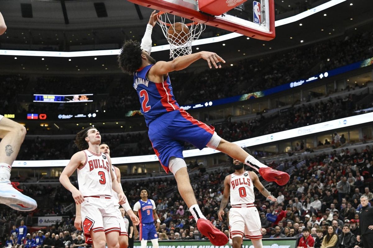 Feb 12, 2025; Chicago, Illinois, USA;  Detroit Pistons guard Cade Cunningham (2) scores against the Chicago Bulls during the second half at the United Center. Mandatory Credit: Matt Marton-Imagn Images