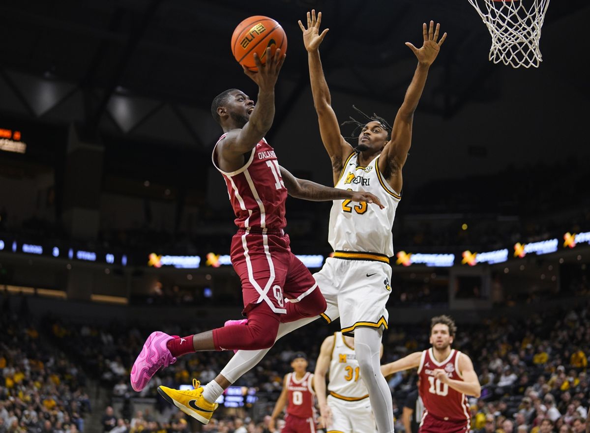 Feb 12, 2025; Columbia, Missouri, USA; Oklahoma Sooners guard Duke Miles (15) shoots against Missouri Tigers guard Aidan Shaw (23) during the second half at Mizzou Arena. Mandatory Credit: Jay Biggerstaff-Imagn Images