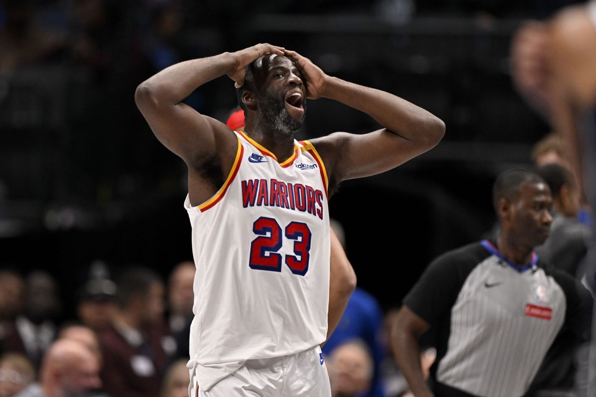 Feb 12, 2025; Dallas, Texas, USA; Golden State Warriors forward Draymond Green (23) reacts to a foul call on three point attempt by Dallas Mavericks guard Kyrie Irving (not pictured) during the fourth quarter at the American Airlines Center. Mandatory Credit: Jerome Miron-Imagn Images
