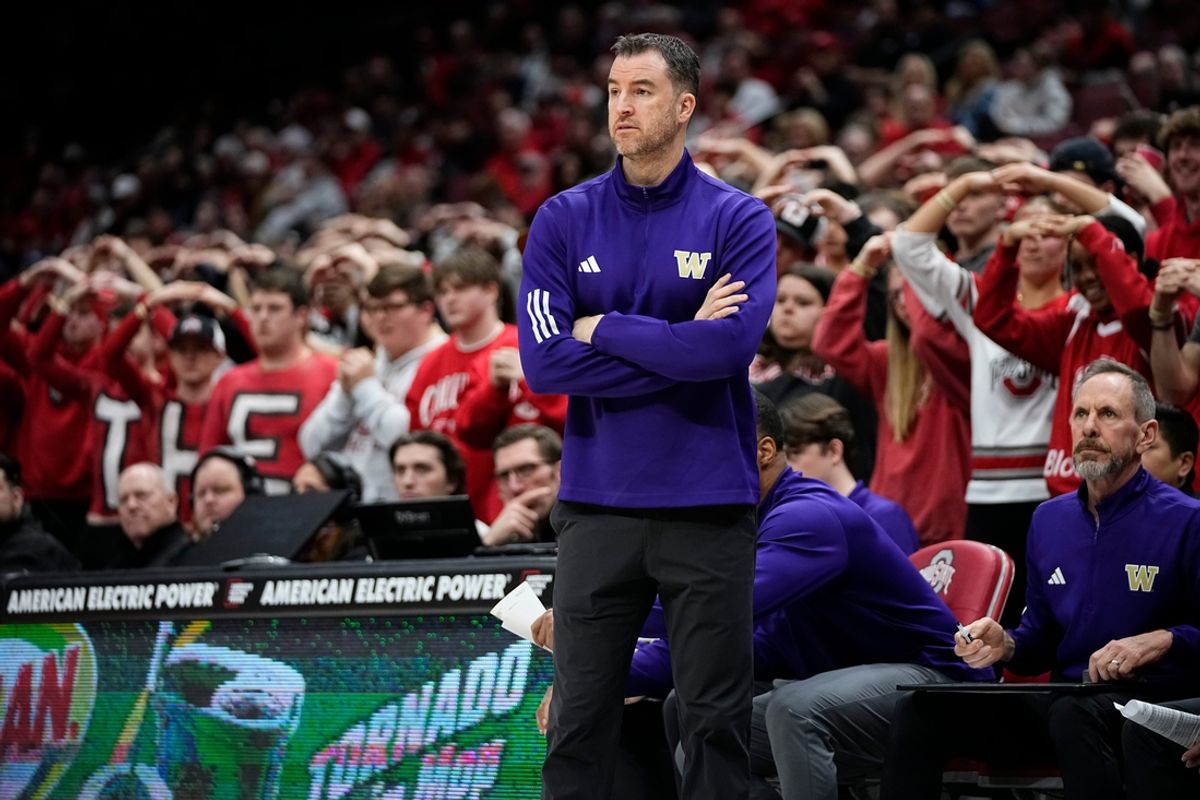 Washington Huskies head coach Danny Sprinkle watches during the NCAA men's basketball game against the Ohio State Buckeyes at Value City Arena in Columbus on Feb. 13, 2025. Ohio State won 93-69.