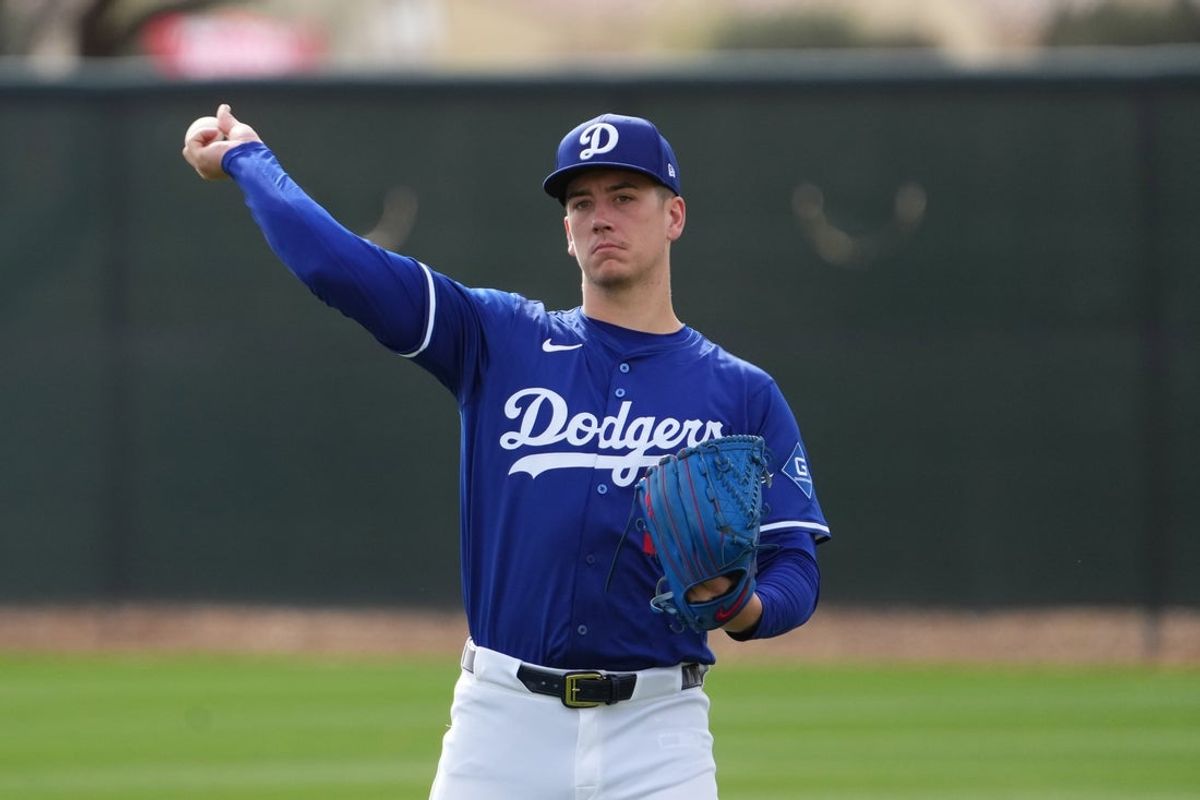 Feb 13, 2025; Glendale, AZ, USA; Los Angeles Dodgers pitcher Bobby Miller (28) throws during a Spring Training workout at Camelback Ranch Mandatory Credit: Joe Camporeale-Imagn Images