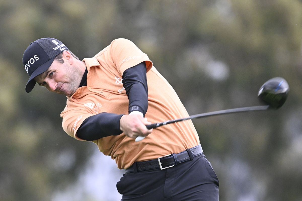 Feb 13, 2025; San Diego, California, USA; Denny McCarthy hits his tee shot on the second hole during the first round of The Genesis Invitational golf tournament at Torreu Pines. Mandatory Credit: Denis Poroy-Imagn Images