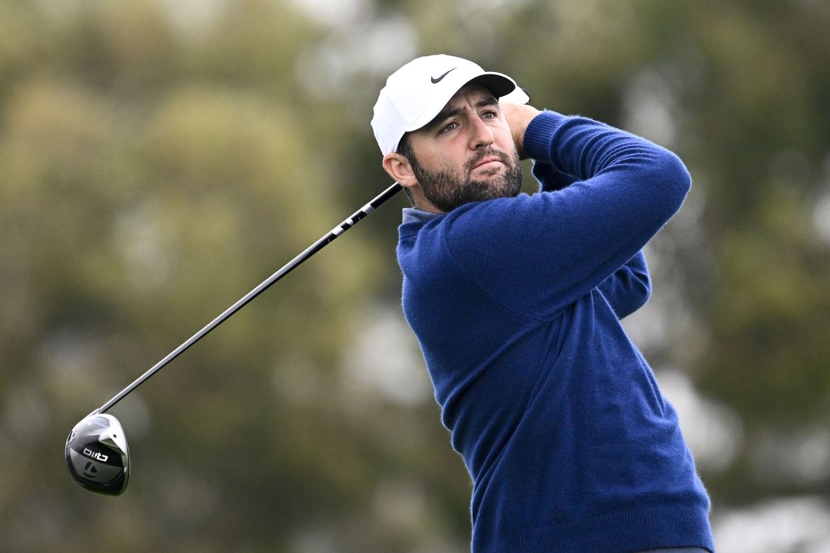 Feb 13, 2025; San Diego, California, USA; Scottie Scheffler hits his tee shot on the second hole during the first round of The Genesis Invitational golf tournament at Torrey Pines. Mandatory Credit: Denis Poroy-Imagn Images