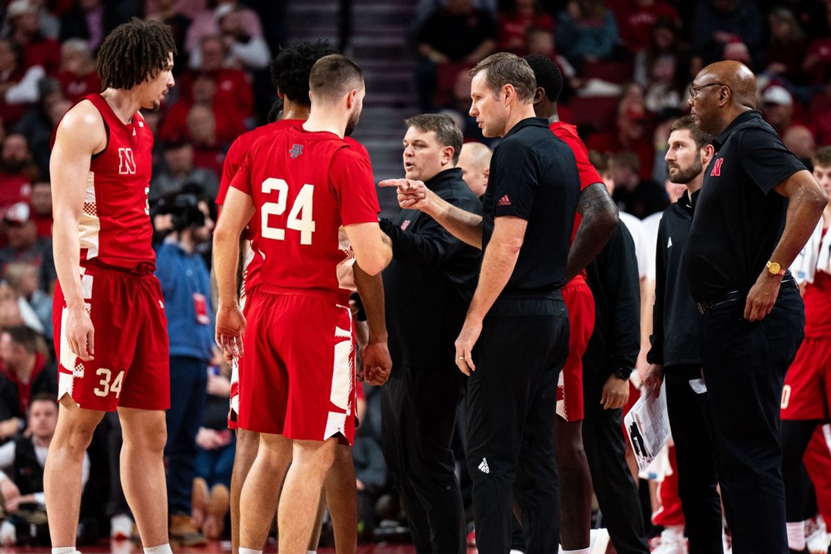 Feb 13, 2025; Lincoln, Nebraska, USA; Nebraska Cornhuskers head coach Fred Hoiberg talks to guard Rollie Worster (24) during a timeout in the first half against the Maryland Terrapins at Pinnacle Bank Arena. Mandatory Credit: Dylan Widger-Imagn Images