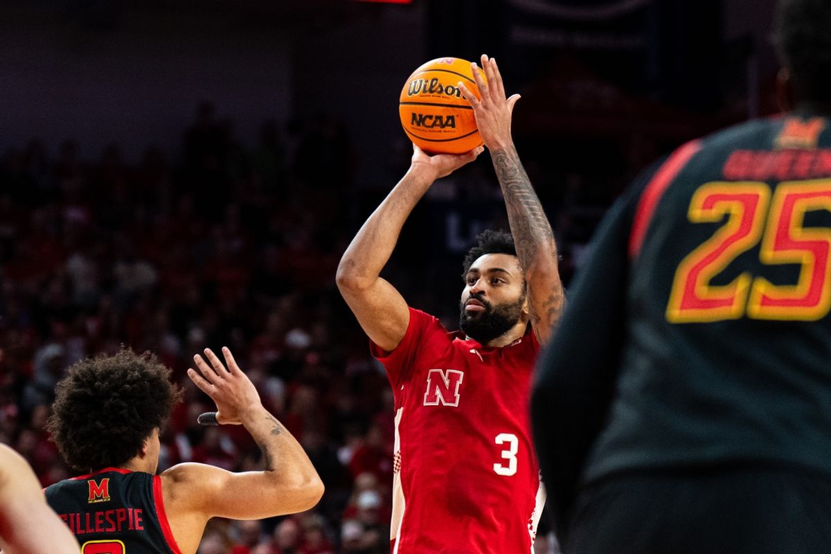 Feb 13, 2025; Lincoln, Nebraska, USA; Nebraska Cornhuskers guard Brice Williams (3) shoots a three point basket against Maryland Terrapins guard Ja'Kobi Gillespie (0) during the first half at Pinnacle Bank Arena. Mandatory Credit: Dylan Widger-Imagn Images