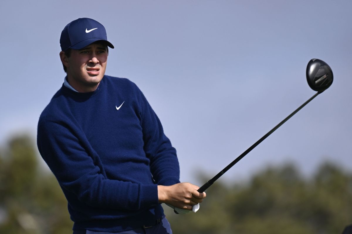 Feb 14, 2025; San Diego, California, USA; Davis Thompson hits his tee shot on the second hole during the second round of The Genesis Invitational golf tournament at Torrey Pines. Mandatory Credit: Denis Poroy-Imagn Images