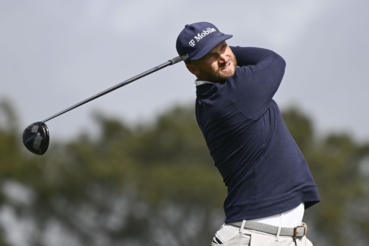 Feb 14, 2025; San Diego, California, USA; Wyndham Clark hits his tee shot on the second hole during the second round of The Genesis Invitational golf tournament at Torrey Pines. Mandatory Credit: Denis Poroy-Imagn Images