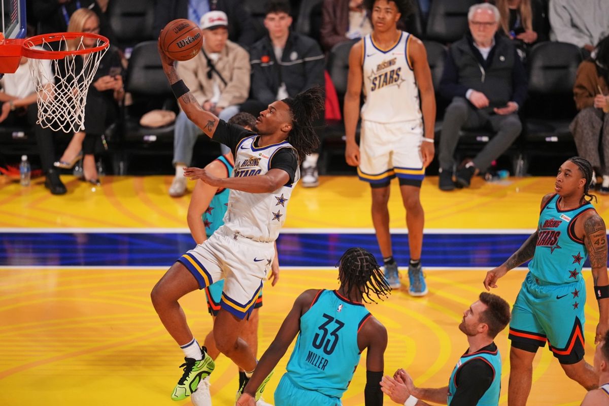 Feb 14, 2025; San Francisco, California, USA; Team C guard Stephon Castle (5) of the San Antonio Spurs controls the ball during the 2025 NBA Rising Stars Game at Chase Center. Mandatory Credit: Cary Edmondson-Imagn Images