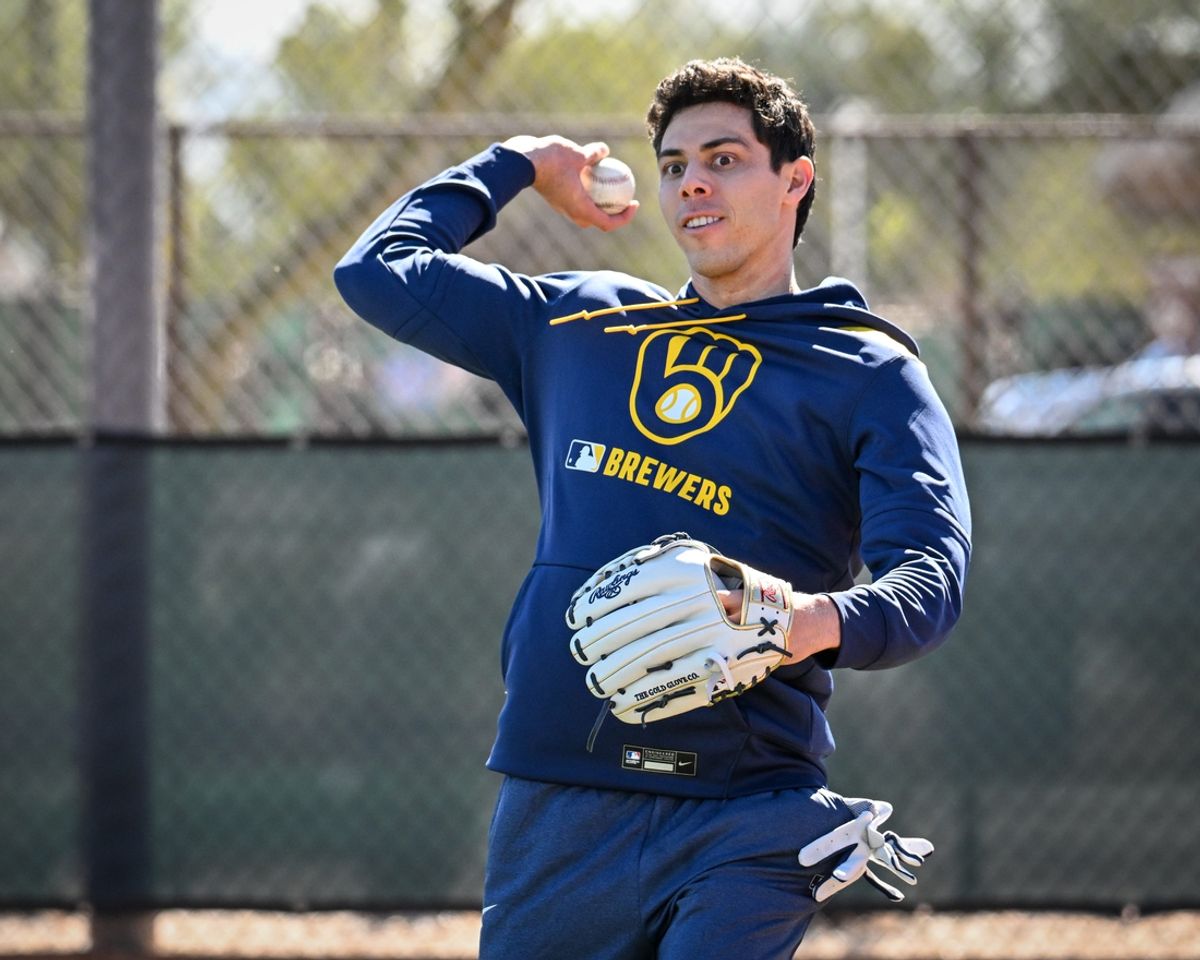 Milwaukee Brewers outfielder Christian Yelich throws during spring training workouts Saturday, February 15, 2025, at the American Family Fields of Phoenix in Phoenix, Arizona.