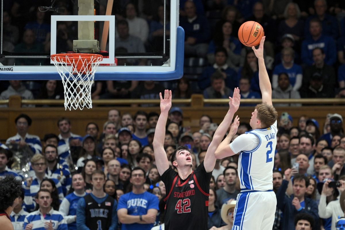Feb 15, 2025; Durham, North Carolina, USA;  Duke Blue Devils forward Cooper Flagg (2) shoots a hook shot against Stanford Cardinal forward Maxime Raynaud (42) during the first half at Cameron Indoor Stadium. Mandatory Credit: Zachary Taft-Imagn Images
