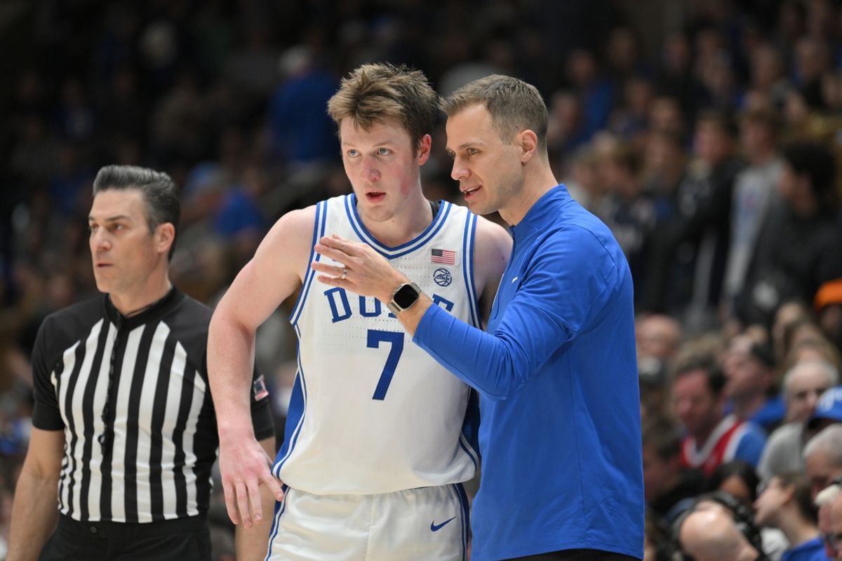 Feb 15, 2025; Durham, North Carolina, USA;  Duke Blue Devils head coach Jon Scheyer directs Duke Blue Devils forward Kon Knueppel (7) during the second half at Cameron Indoor Stadium. Blue Devils won 106-70. Mandatory Credit: Zachary Taft-Imagn Images