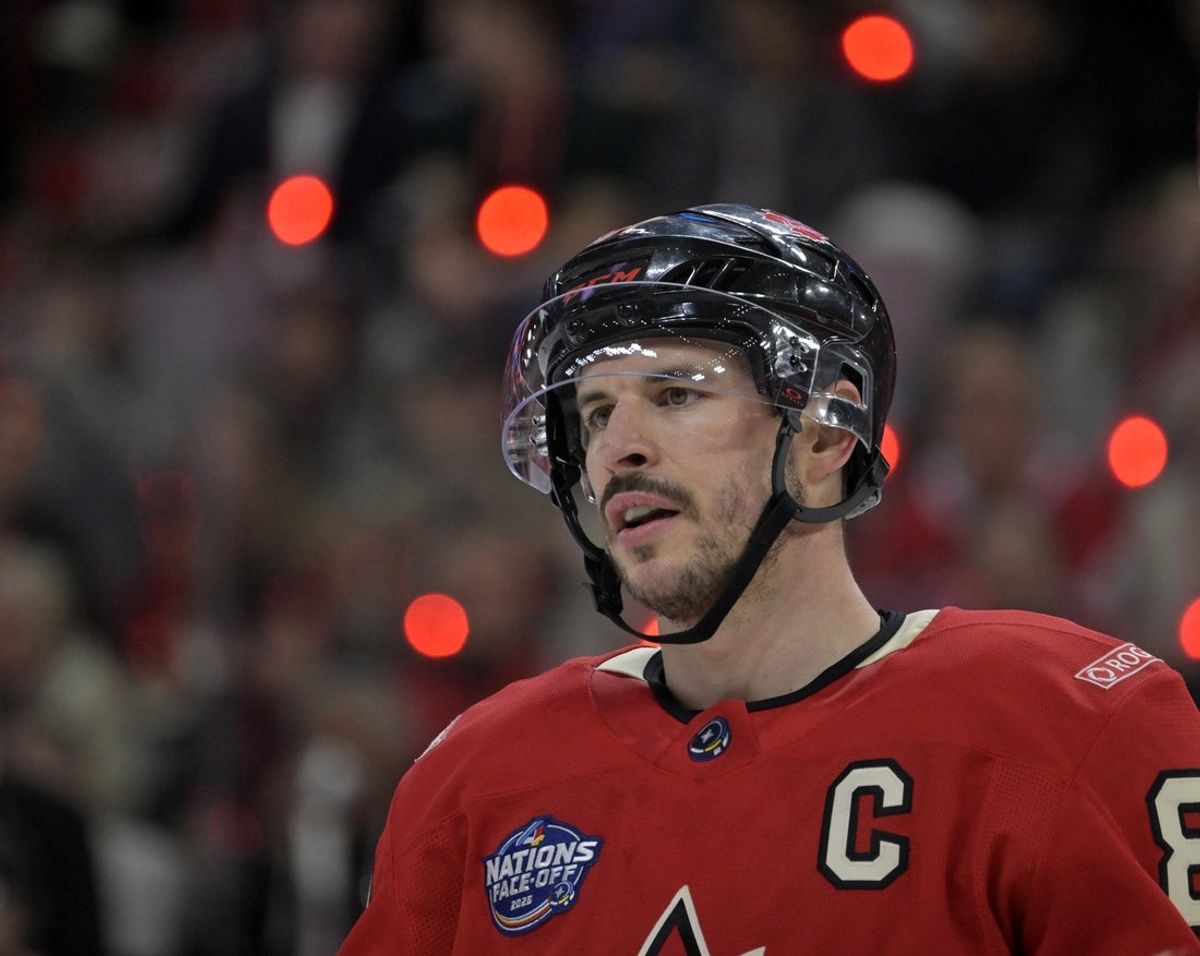 Feb 15, 2025; Montreal, Quebec, CAN; [Imagn Images direct customers only] Team Canada forward Sidney Crosby (87) prepares for a face-off against Team United States in the second period during a 4 Nations Face-Off ice hockey game at the Bell Centre. Mandatory Credit: Eric Bolte-Imagn Images