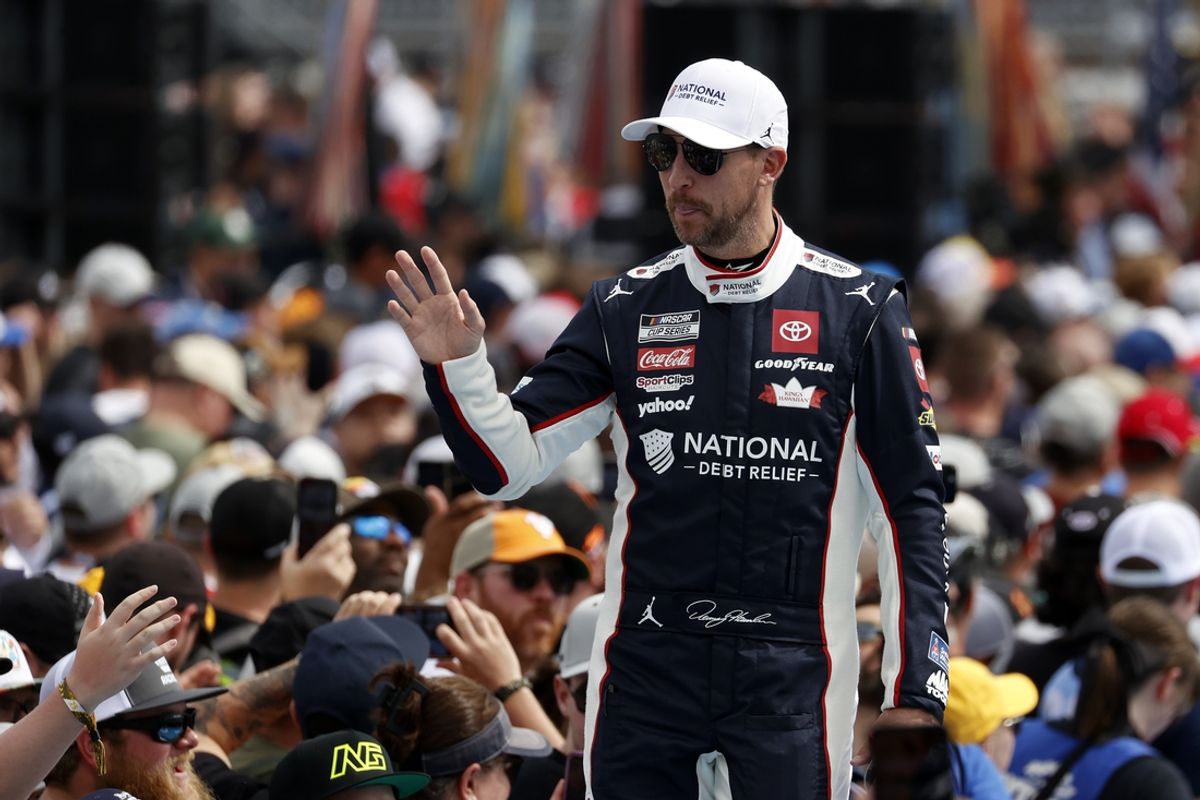 Feb 16, 2025; Daytona Beach, Florida, USA; NASCAR Cup Series driver Denny Hamlin (11) during the Daytona 500 at Daytona International Speedway. Mandatory Credit: Peter Casey-Imagn Images