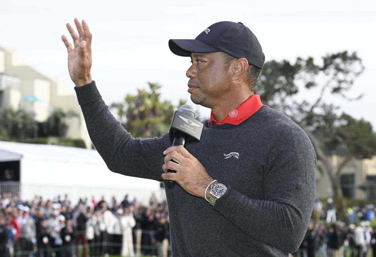 Feb 16, 2025; San Diego, California, USA; Tiger Woods waves to the fans at The Genesis Invitational golf tournament at Torrey Pines. Mandatory Credit: Denis Poroy-Imagn Images