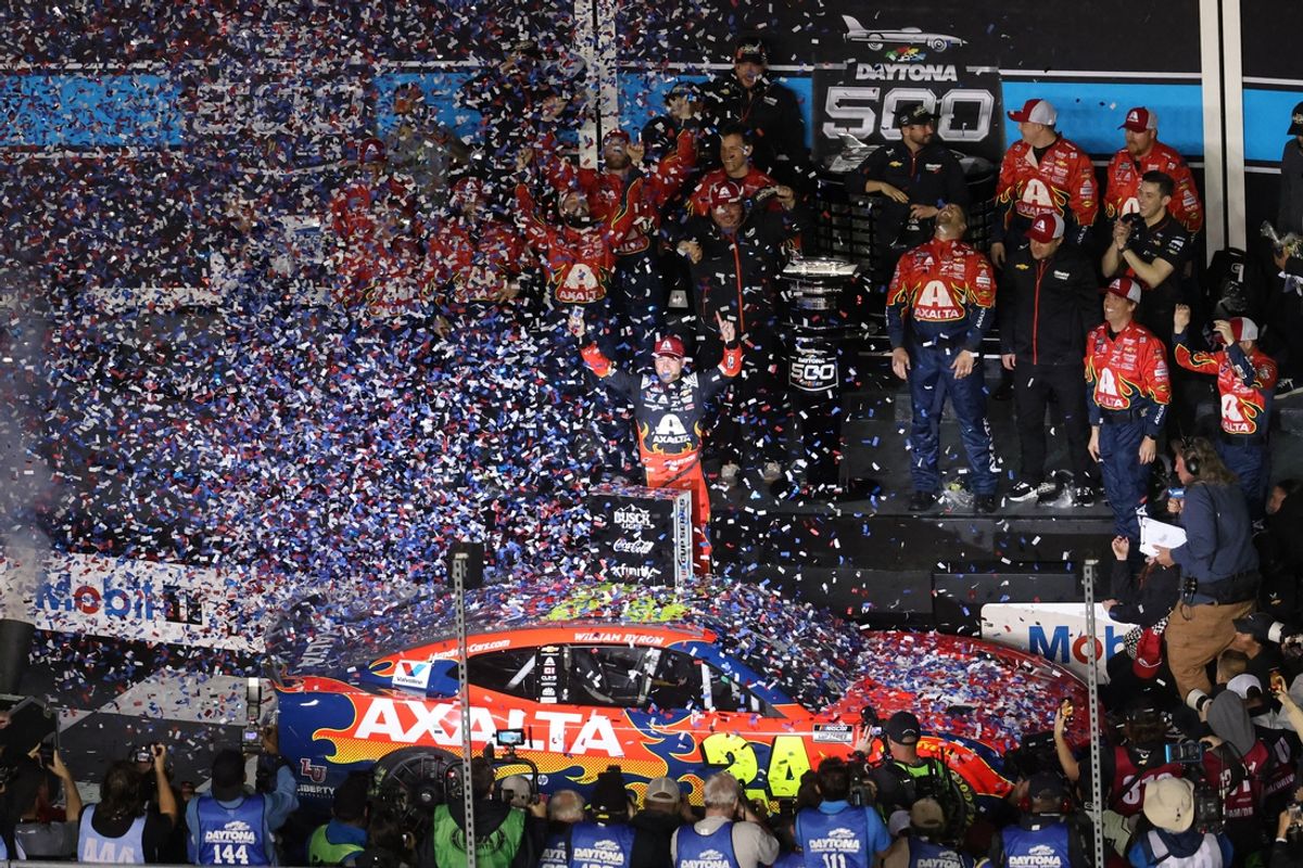 Feb 16, 2025; Daytona Beach, Florida, USA; NASCAR Cup Series driver William Byron (24) reacts in victory lane during the Daytona 500 at Daytona International Speedway. Mandatory Credit: Mark J. Rebilas-Imagn Images