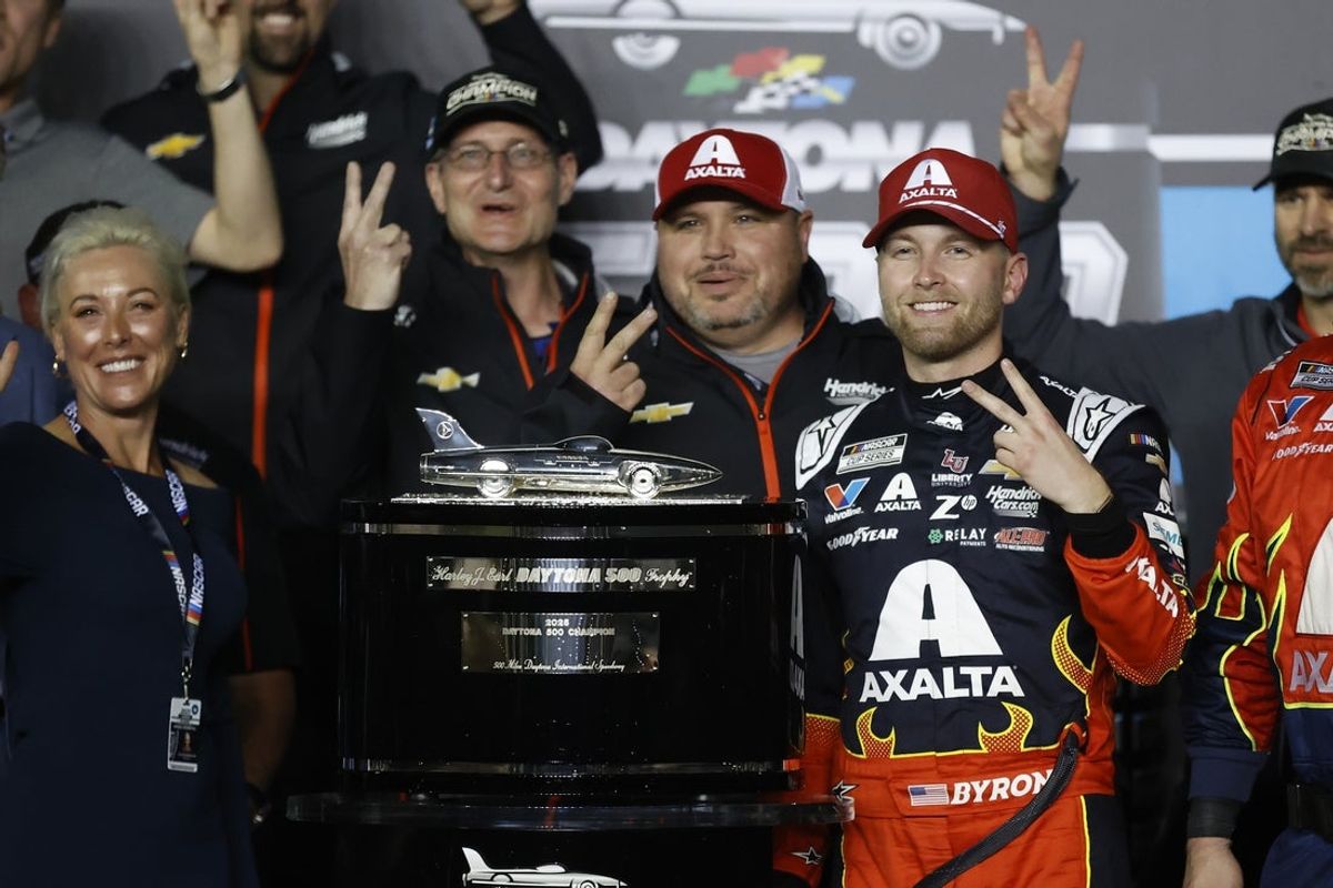 Feb 16, 2025; Daytona Beach, Florida, USA;  NASCAR Cup Series driver William Byron (24) poses with the Harley J. Earl trophy after winning the Daytona 500 at Daytona International Speedway. Mandatory Credit: Peter Casey-Imagn Images