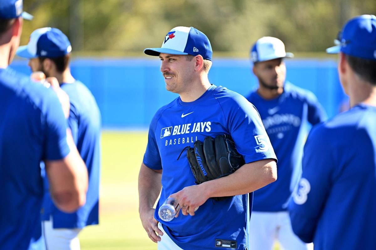Feb 17, 2025; Dunedin, FL, USA;  Toronto Blue Jays pitcher Erik Swanson (50) prepares for a drill during spring training at Cecil B. Englebert Complex. Mandatory Credit: Jonathan Dyer-Imagn Images
