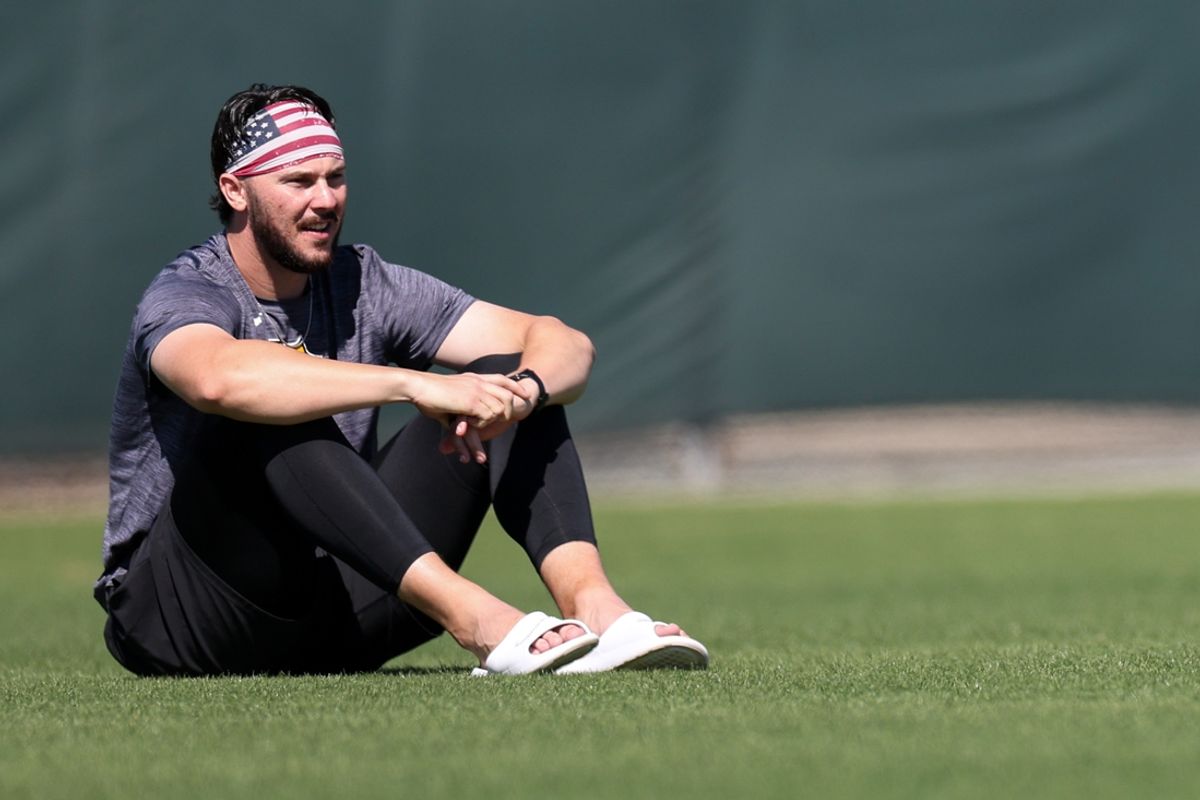 Feb 17, 2025; Bradenton, FL, USA;  Pittsburgh Pirates pitcher Paul Skenes (30) looks on from the outfield during spring training workouts at Pirate City. Mandatory Credit: Nathan Ray Seebeck-Imagn Images