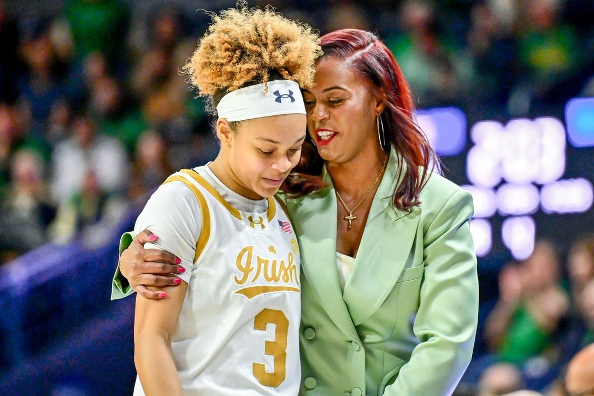 Feb 17, 2025; South Bend, Indiana, USA; Notre Dame Fighting Irish head coach Niele Ivey talks to guard Hannah Hidalgo (3) in the second half against the Duke Blue Devils at the Purcell Pavilion. Mandatory Credit: Matt Cashore-Imagn Images
