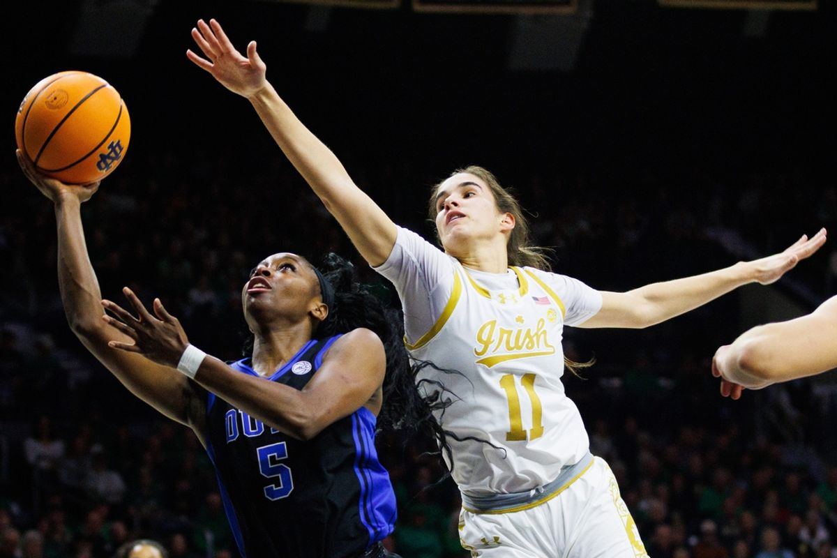 Notre Dame guard Sonia Citron (11) attempts to block a shot by Duke guard Oluchi Okananwa (5) during a NCAA women's basketball game between No. 1 Notre Dame and No. 11 Duke at Purcell Pavilion on Monday, Feb. 17, 2025, in South Bend.
