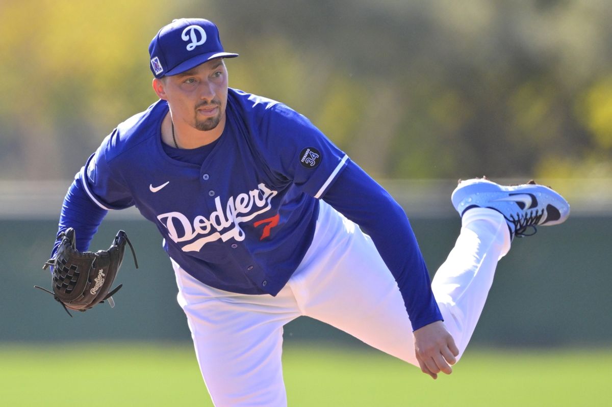 Feb 18, 2025; Glendale, AZ, USA;  Los Angeles Dodgers starting pitcher Blake Snell (7) throws live batting practice during spring training workouts at Camelback Ranch. Mandatory Credit: Jayne Kamin-Oncea-Imagn Images
