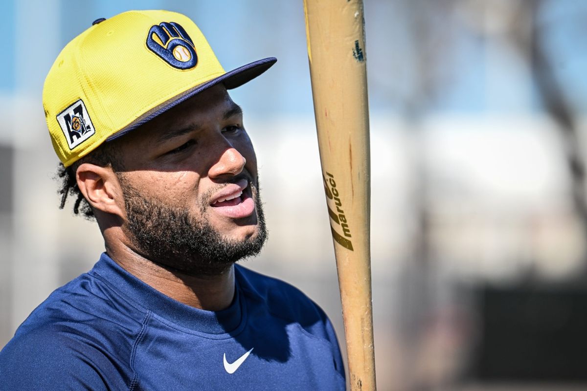 Milwaukee Brewers outfielder Jackson Chourio waits for a turn in the batting cage during spring training workouts Tuesday, February 18, 2025, at American Family Fields of Phoenix in Phoenix, Arizona.