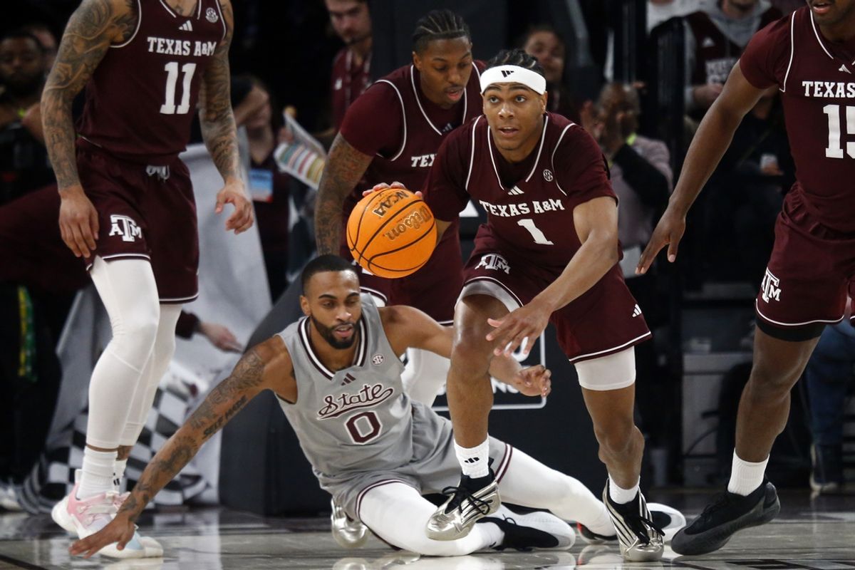 Feb 18, 2025; Starkville, Mississippi, USA; Texas A&M Aggies guard Zhuric Phelps (1) dribbles during the first half against the Mississippi State Bulldogs at Humphrey Coliseum. Mandatory Credit: Petre Thomas-Imagn Images