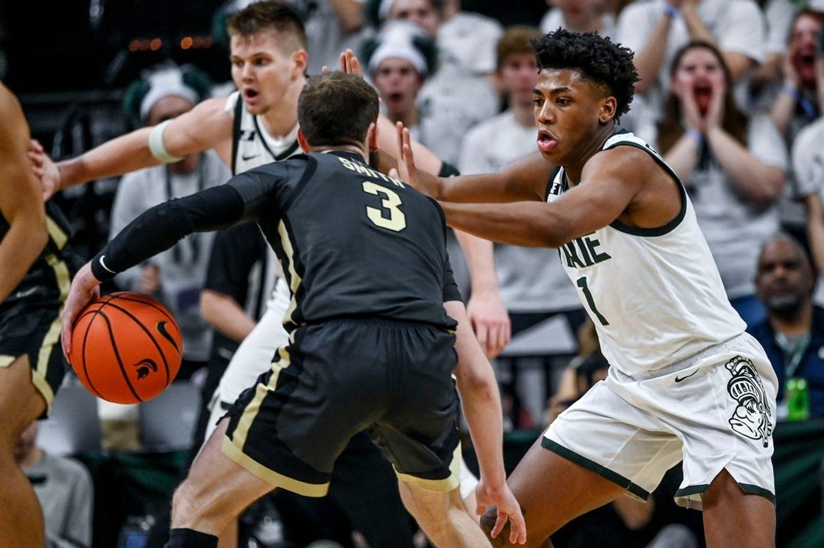 Michigan State's Jeremy Fears Jr., right, guards Purdue's Braden Smith during the second half on Tuesday, Feb. 18, 2025, at the Breslin Center in East Lansing.