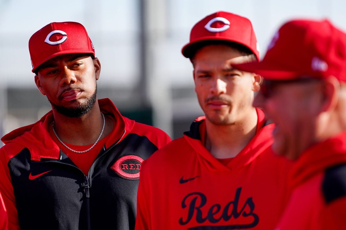 Cincinnati Reds pitcher Hunter Greene (21) listens in while manger Terry Francona speaks with players, Wednesday, Feb. 19, 2025, at the Cincinnati Reds Player Development Complex in Goodyear, Ariz.