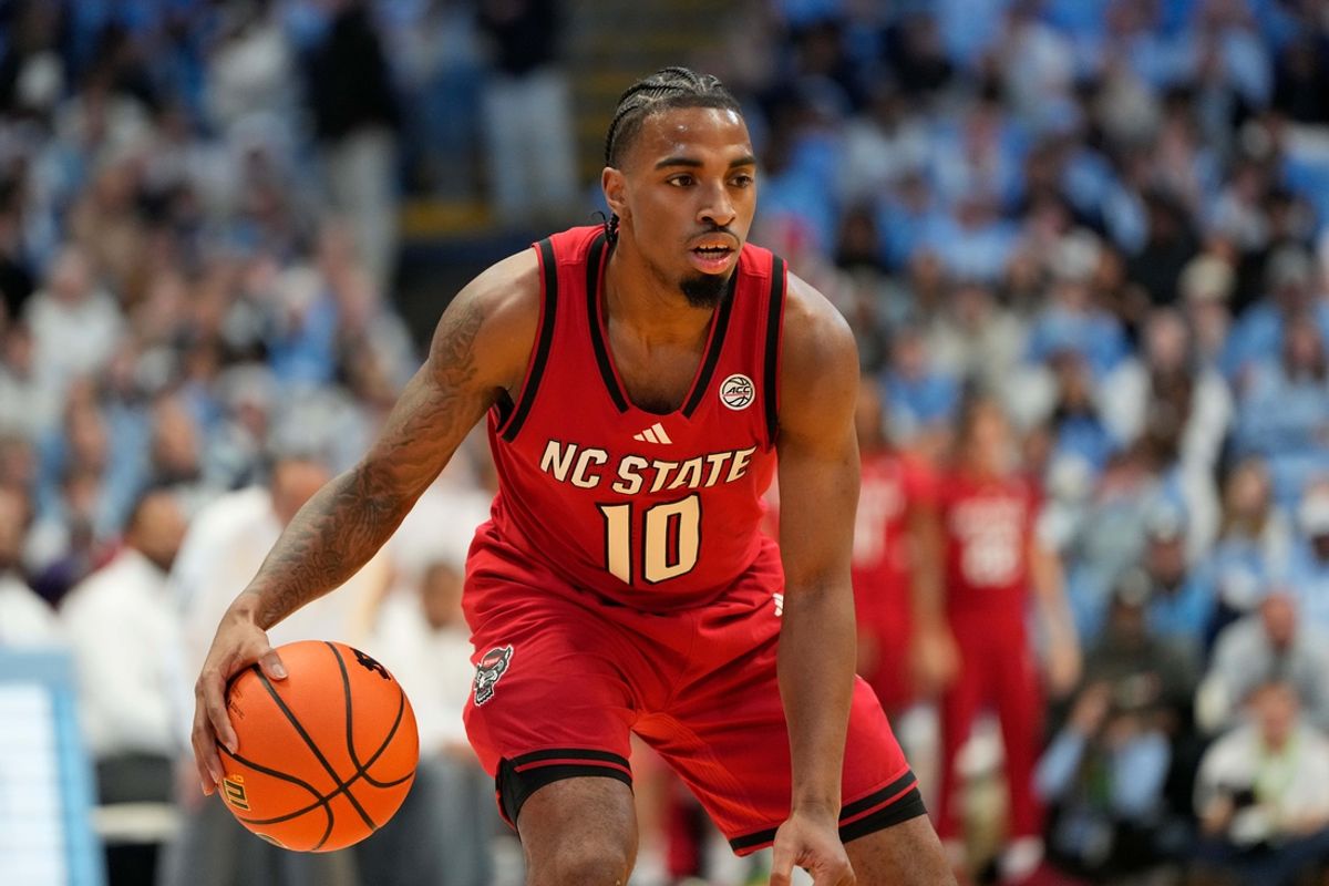 Feb 19, 2025; Chapel Hill, North Carolina, USA; North Carolina State Wolfpack guard Marcus Hill (10) with the ball in the first half at Dean E. Smith Center. Mandatory Credit: Bob Donnan-Imagn Images