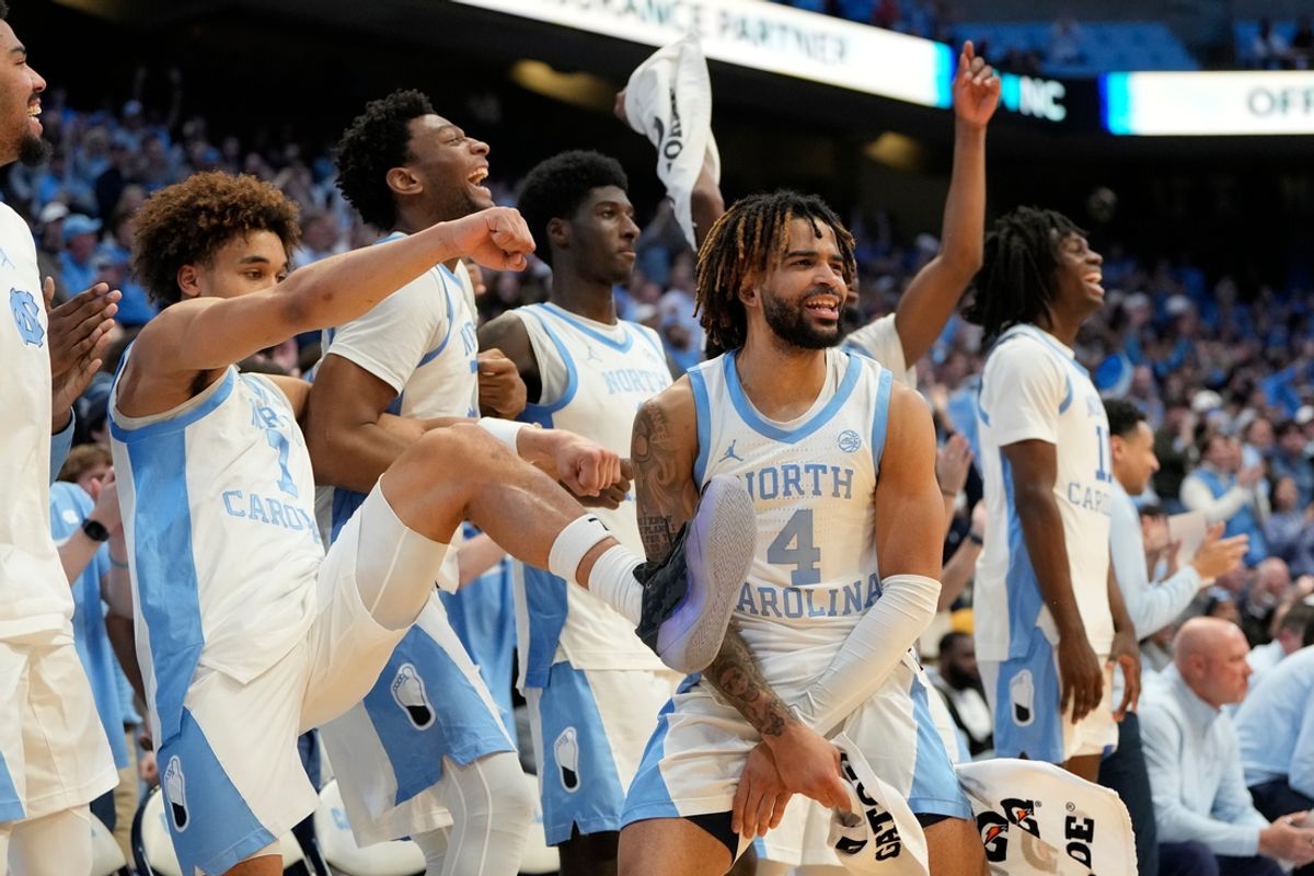 Feb 19, 2025; Chapel Hill, North Carolina, USA; North Carolina Tar Heels guard RJ Davis (4) and teammates react in the second half at Dean E. Smith Center. Mandatory Credit: Bob Donnan-Imagn Images