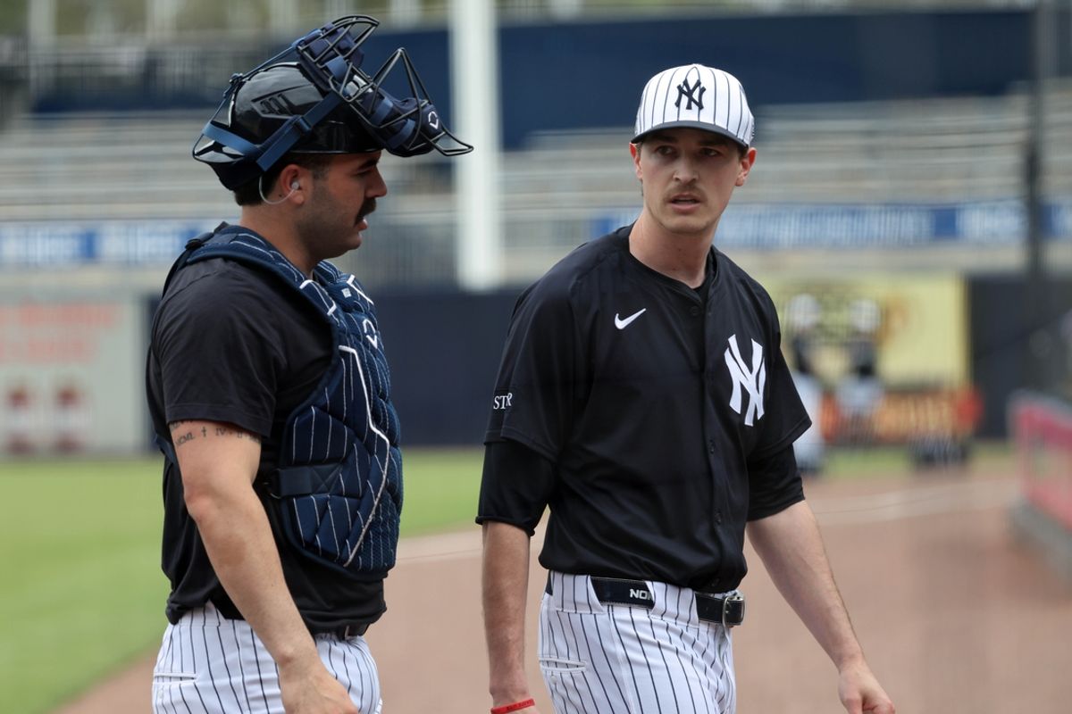 Feb 20, 2025; Tampa, FL, USA; New York Yankees pitcher Max Fried (54) and catcher Austin Wells (28) talk at George M. Steinbrenner Field. Mandatory Credit: Kim Klement Neitzel-Imagn Images