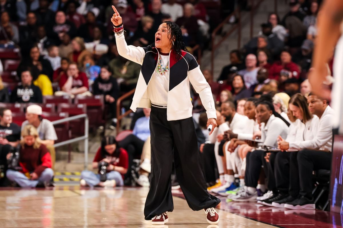 Feb 20, 2025; Columbia, South Carolina, USA; South Carolina Gamecocks head coach Dawn Staley directs her team against the Arkansas Razorbacks in the first half at Colonial Life Arena. Mandatory Credit: Jeff Blake-Imagn Images