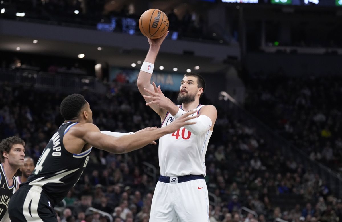Feb 20, 2025; Milwaukee, Wisconsin, USA; Los Angeles Clippers center Ivica Zubac (40) puts up a shot against Milwaukee Bucks forward Giannis Antetokounmpo (34) in the first half at Fiserv Forum. Mandatory Credit: Michael McLoone-Imagn Images