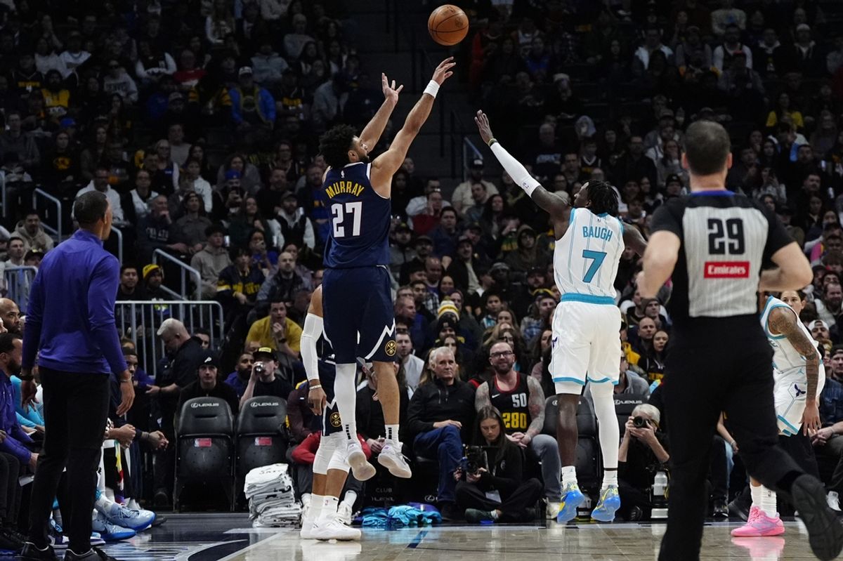 Feb 20, 2025; Denver, Colorado, USA; Denver Nuggets guard Jamal Murray (27) shoots the ball in the first quarter against the Charlotte Hornets at Ball Arena. Mandatory Credit: Ron Chenoy-Imagn Images