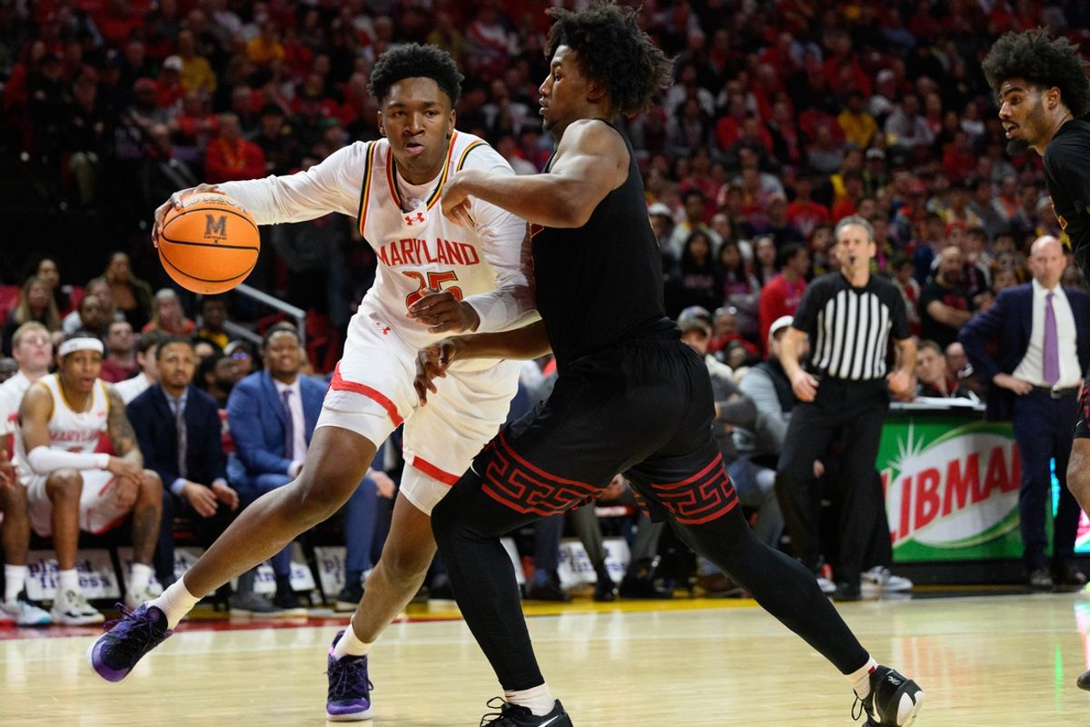 Feb 20, 2025; College Park, Maryland, USA; Maryland Terrapins center Derik Queen (25) handles the ball during the second half against the USC Trojans at Xfinity Center. Mandatory Credit: Reggie Hildred-Imagn Images