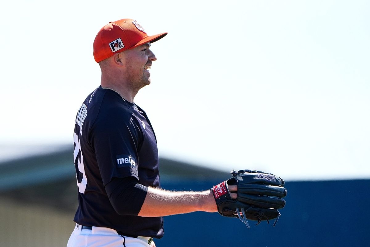 Detroit Tigers pitcher Tarik Skubal smiles after throwing a pitch during spring training at TigerTown in Lakeland, Fla. on Friday, Feb. 21, 2025.