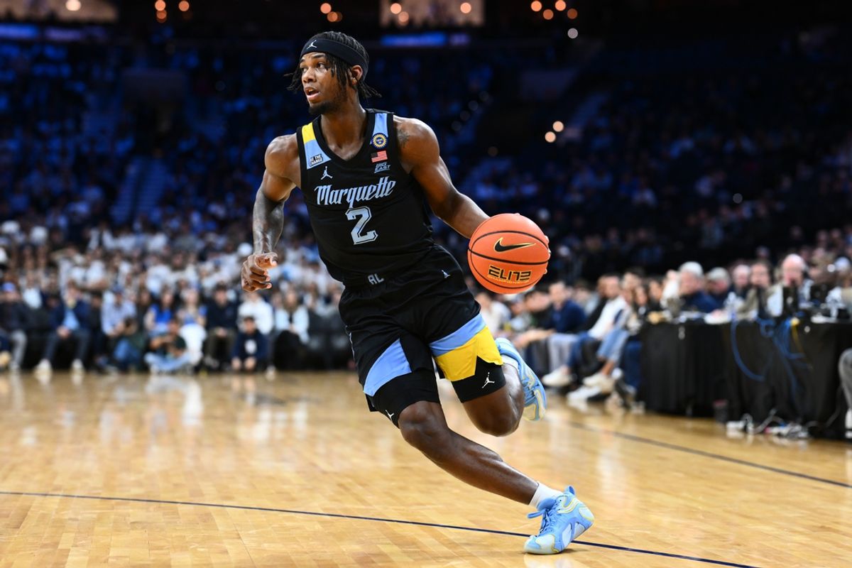 Feb 21, 2025; Philadelphia, Pennsylvania, USA; Marquette Golden Eagles guard Chase Ross (2) controls the ball against the Villanova Wildcats in the first half at Wells Fargo Center. Mandatory Credit: Kyle Ross-Imagn Images