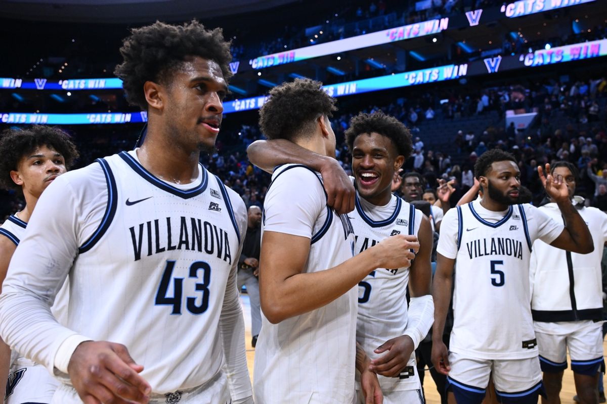 Feb 21, 2025; Philadelphia, Pennsylvania, USA; Villanova Wildcats guard Jordan Longino (15) reacts with forward Jordann Dumont (10) after the game against the Marquette Golden Eagles at Wells Fargo Center. Mandatory Credit: Kyle Ross-Imagn Images