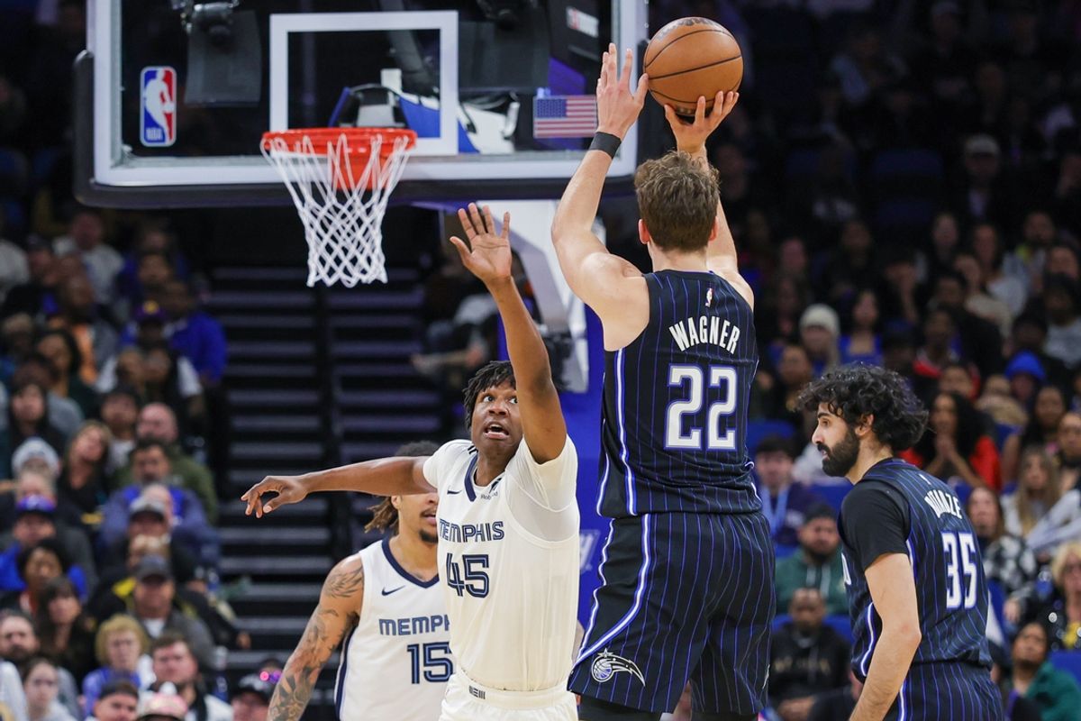 Feb 21, 2025; Orlando, Florida, USA; Orlando Magic forward Franz Wagner (22) shoots against Memphis Grizzlies forward GG Jackson (45) during the second half at Kia Center. Mandatory Credit: Mike Watters-Imagn Images