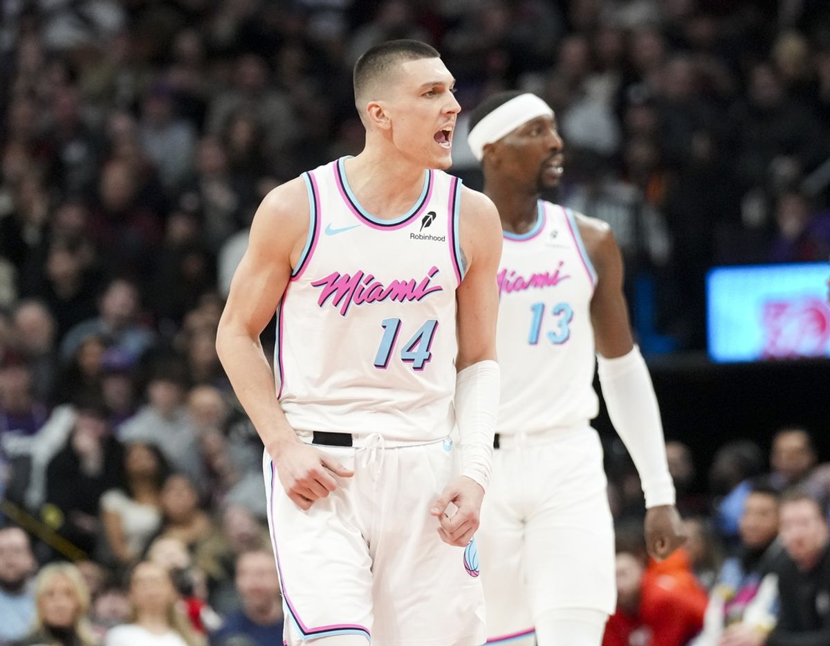 Feb 21, 2025; Toronto, Ontario, CAN; Miami Heat guard Tyler Herro (14) celebrates after scoring against the Toronto Raptors during the second half at Scotiabank Arena. Mandatory Credit: Kevin Sousa-Imagn Images